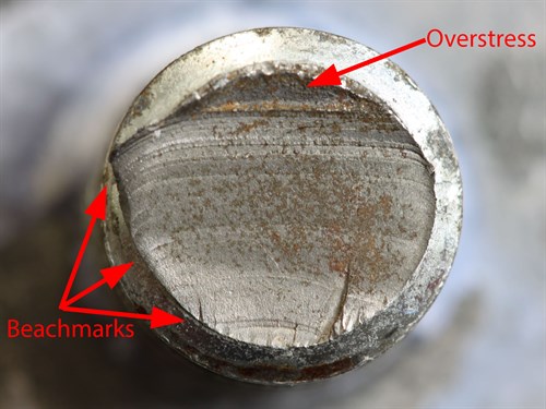 Bolt fracture surface showing evidence of fatigue crack progression (beach) marks